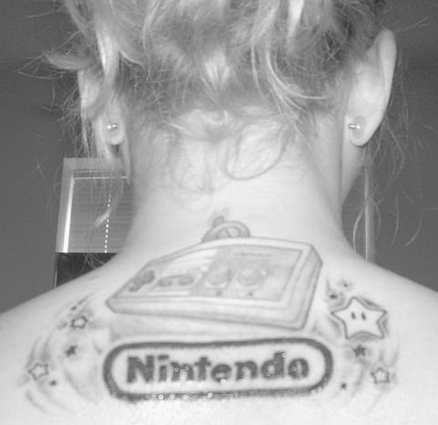 Is the first one a black and white tattoo?? I wonder…. funny nintendo tattoo