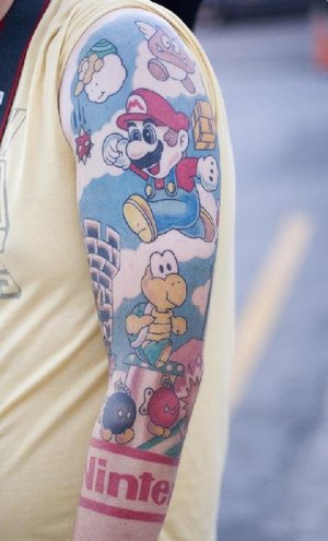 The Mario Sleeve tattoo with an actual scene from the game